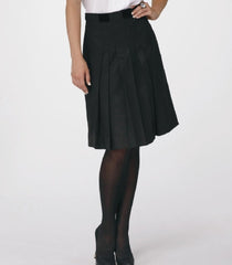 Pert Knife-Pleated Black Wool Skirt with Black Velvet Bow.